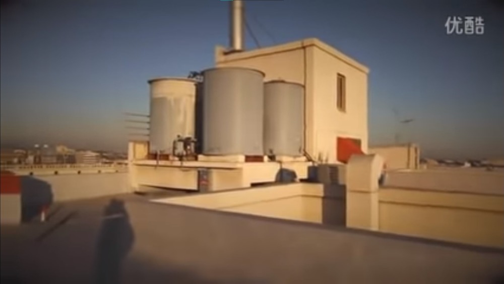 The water tanks on top of the Cecil Hotel