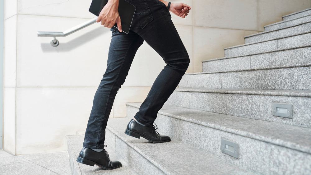 Man walking up the stairs