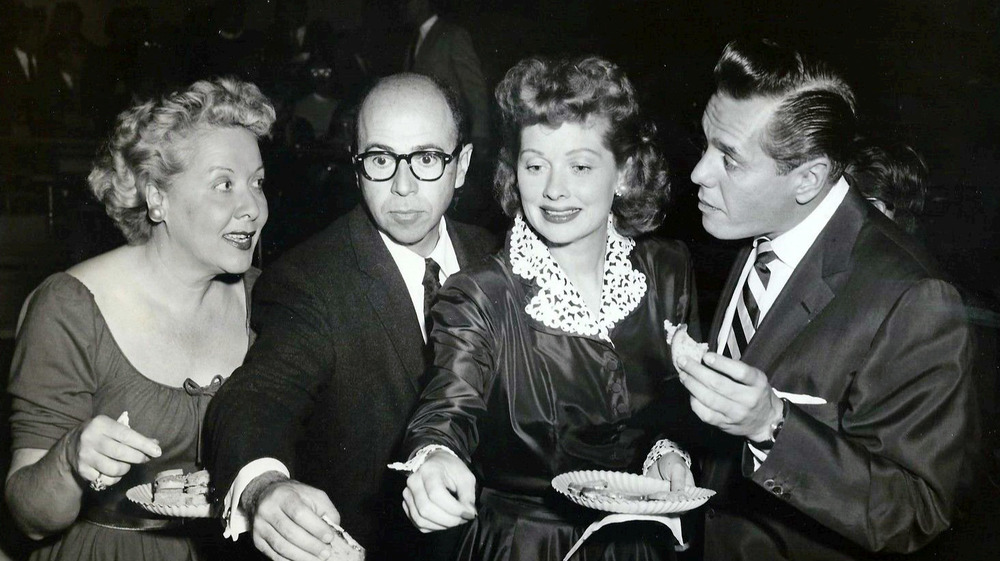 from left: Vivian Vance, Jess Oppenheimer,  Lucille Ball Desi Arnaz at a party