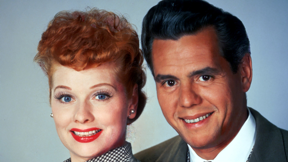 publicity photo of Lucy & Desi Arnaz smiling 