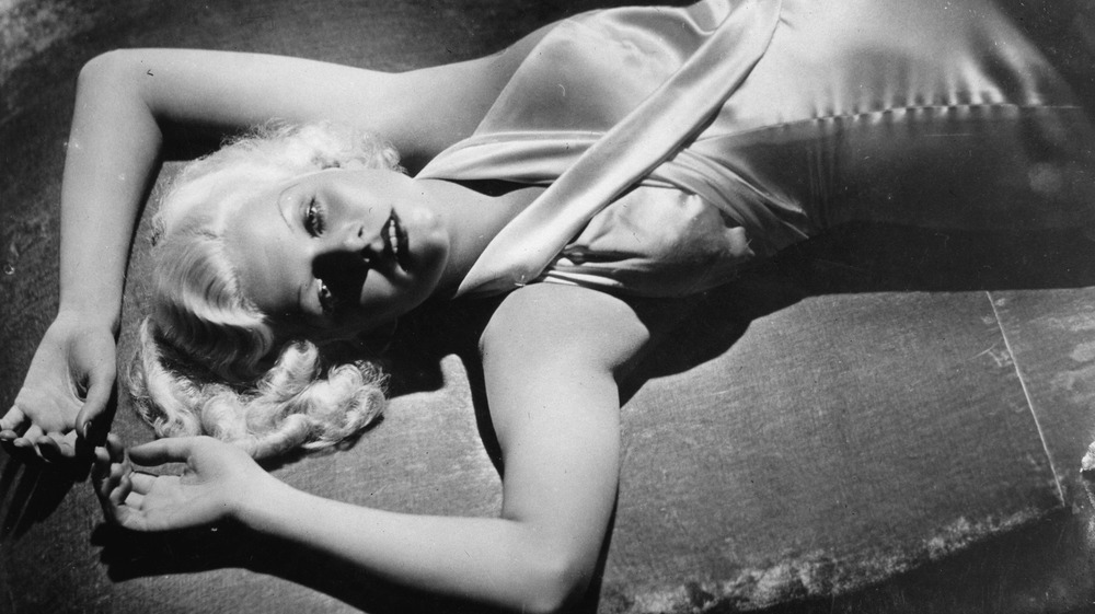 Jean Harlow lying seductively