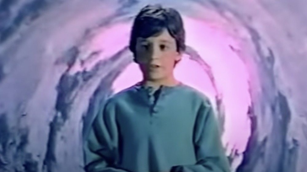 Into the Light TV commercial with kid in front of purple background