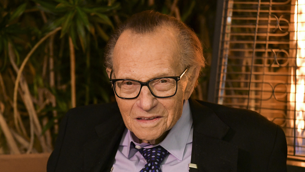 Larry King at a party 