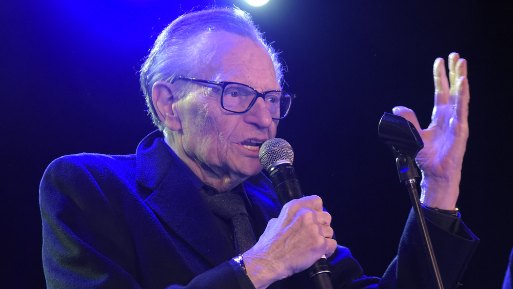 Larry King at the microphone