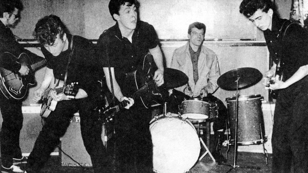 The Silver Beatles (L-R Stu Sutcliffe, John Lennon, Paul McCartney, Johnny Hutch and George Harrison) on stage in 1960 in Liverpool England. The drummer Johnny Hutch was sitting in as they did not have a regular drummer that day.