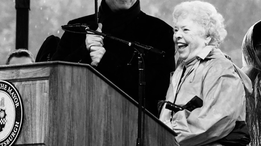 Joanne Rogers smiling in rain