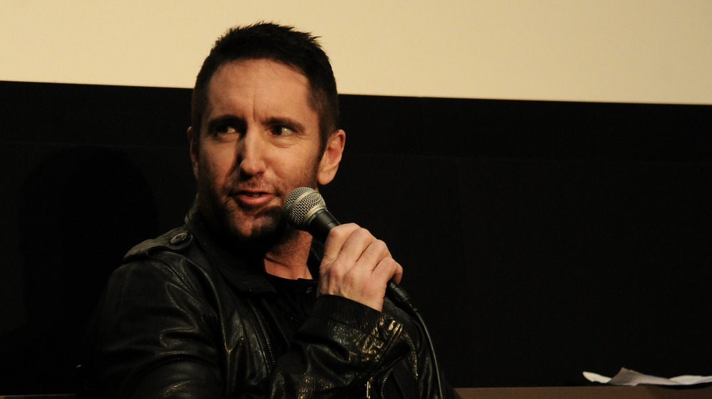 Trent Reznor Holding Microphone