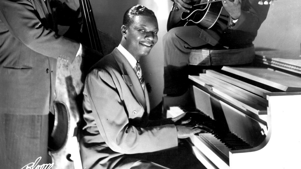 Nat King Cole playing the piano