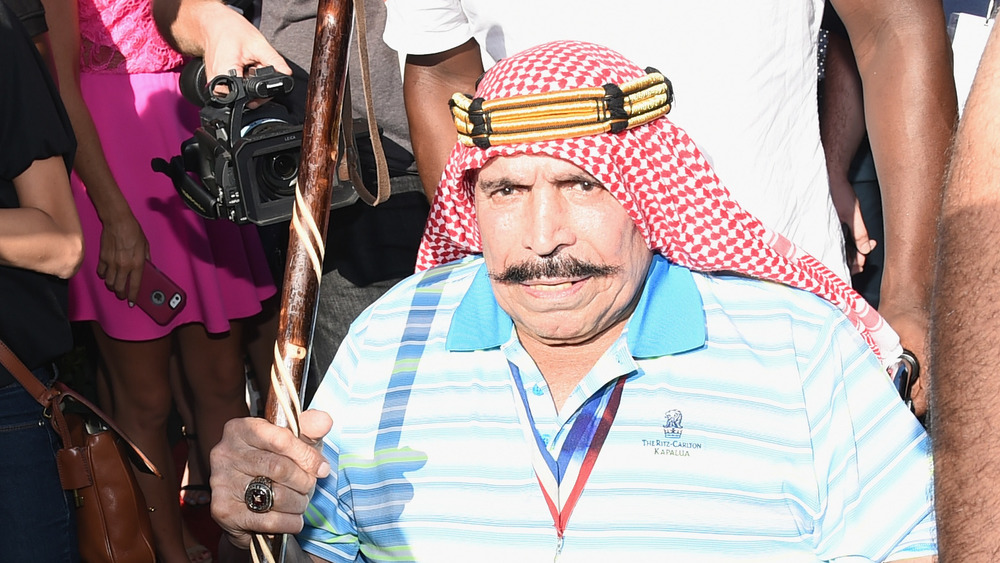The Iron Sheik with a cane