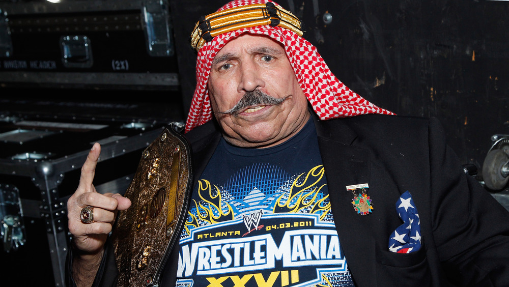 The Iron Sheik in a Wrestlemania shirt