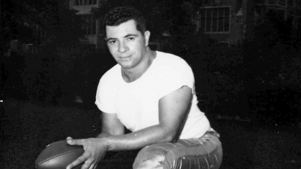 young Vince Lombardi holding football