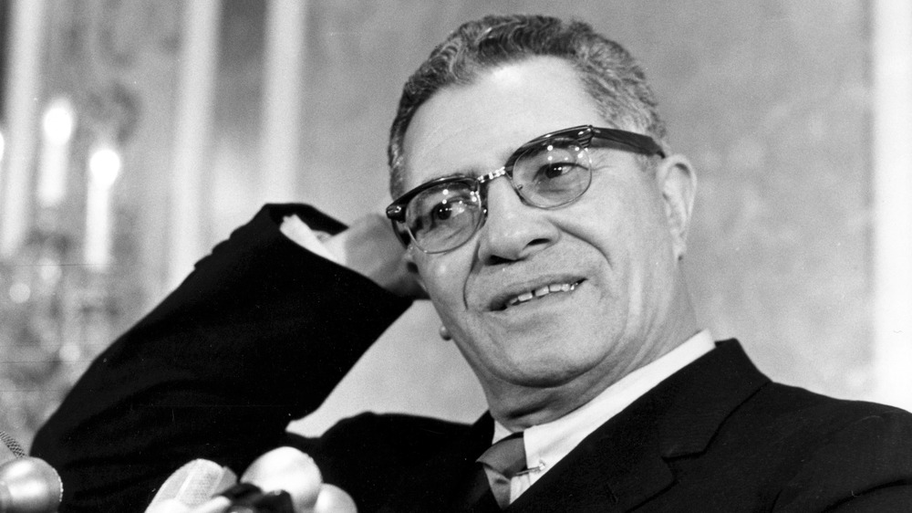 Vince Lombardi with hand on head