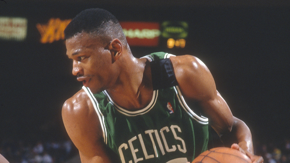 Reggie Lewis, sweaty with basketball