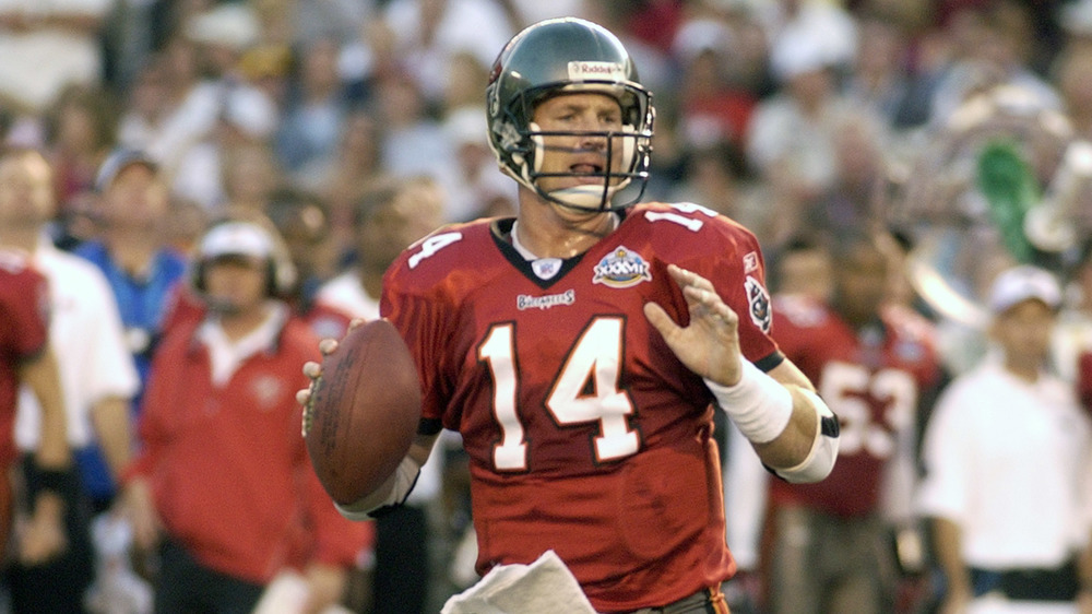 Brad Johnson holding football