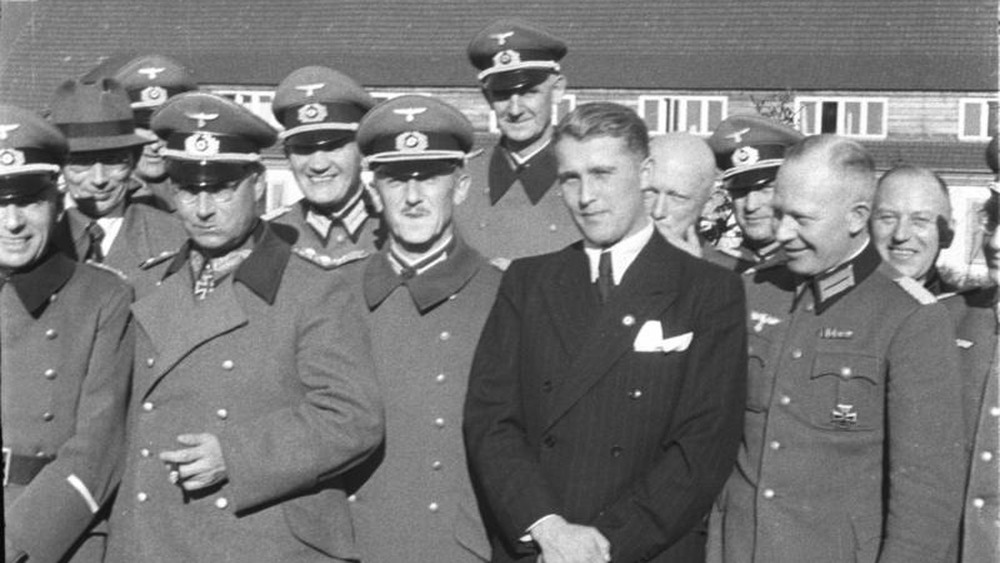 Werner von Braun standing with Nazi officials