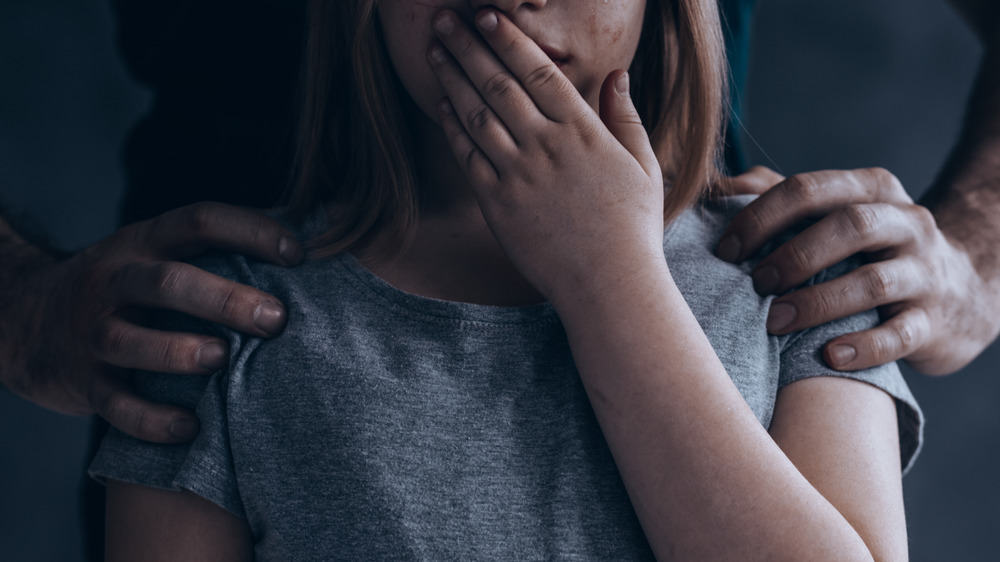 girl and adult hands