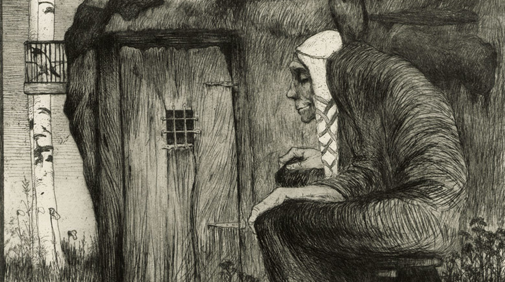 drawing of a witch sitting outside hut
