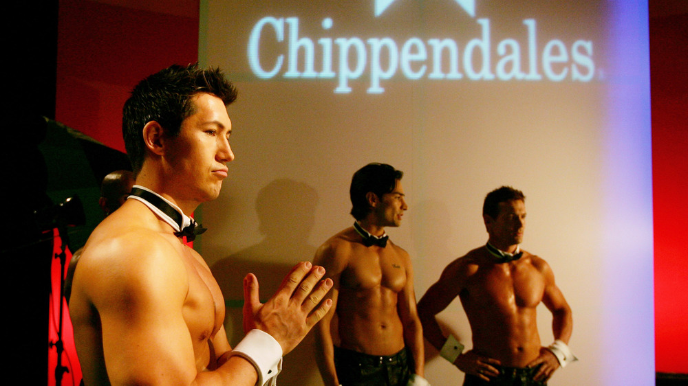 Chippendales dancers posing for photos