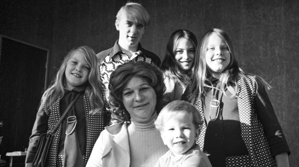 Elizabeth Carmichael posing with her family