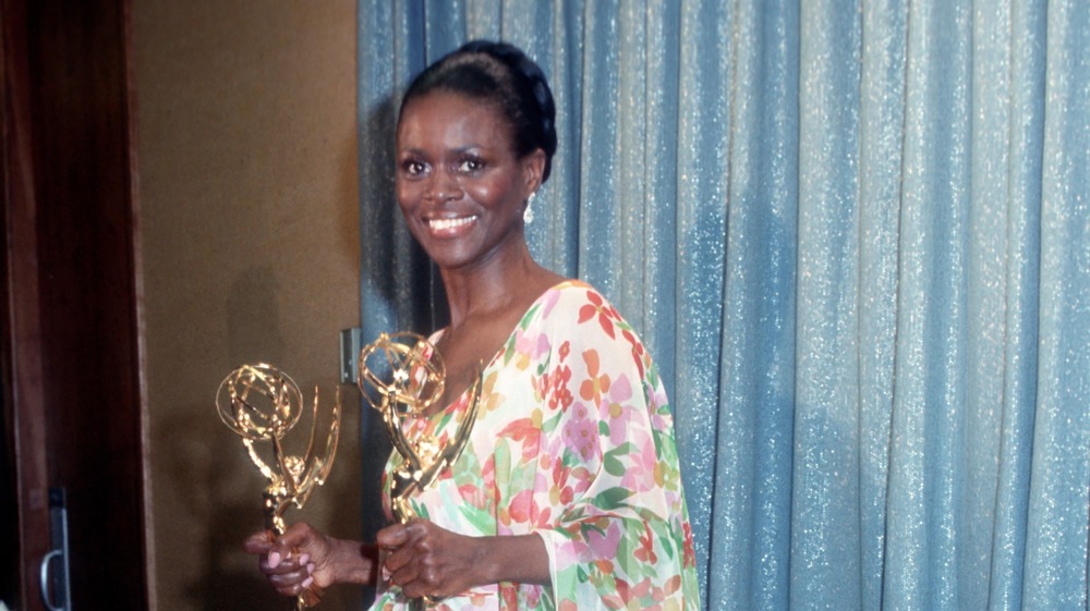Cicely Tyson holding Emmys