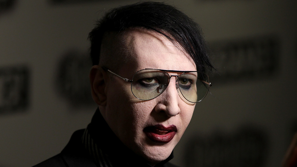 Marilyn Manson wearing glasses