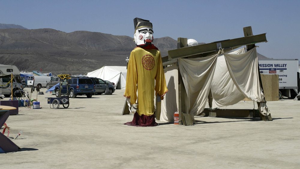 A large statue in traditional Chinese costume