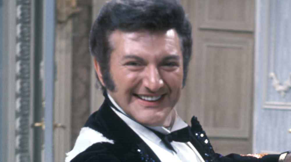 Liberace smiling