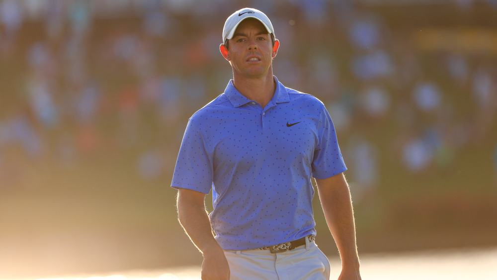 Rory McIlroy evaluates a shot