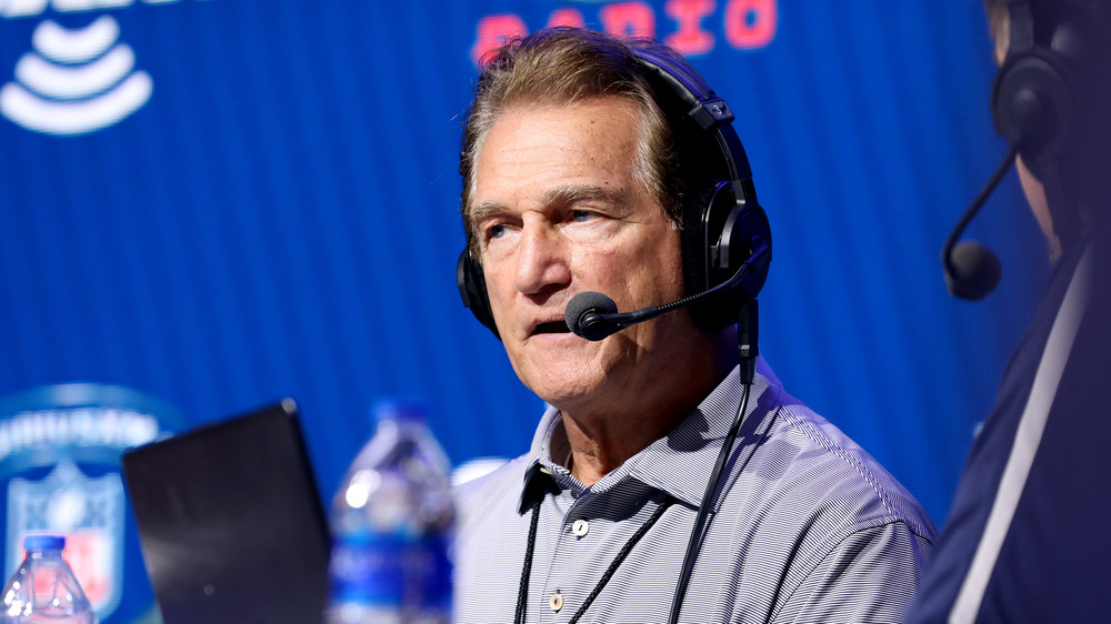 Joe Theismann wearing headset