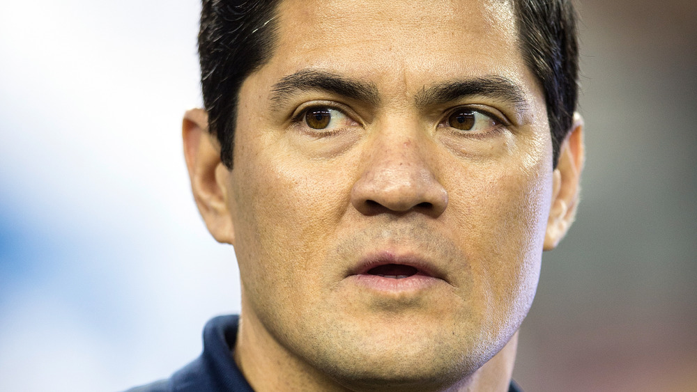 Tedy Bruschi looking to the side