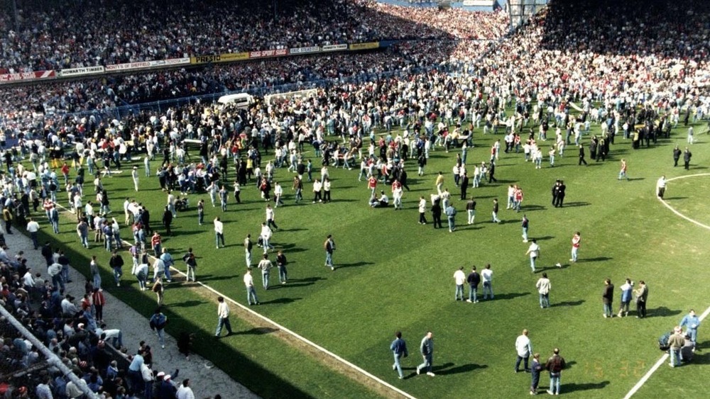 A wide shot of the ensuing disaster at Hillsborough shown at the inquest