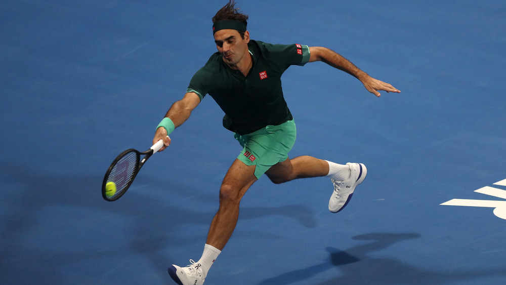 Roger Federer hits a forehand