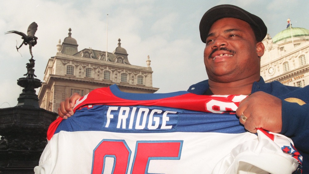 William Perry poses with jersey