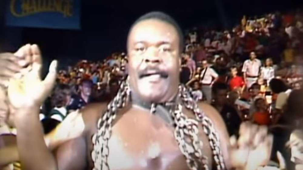 Junkyard Dog with chains and collar