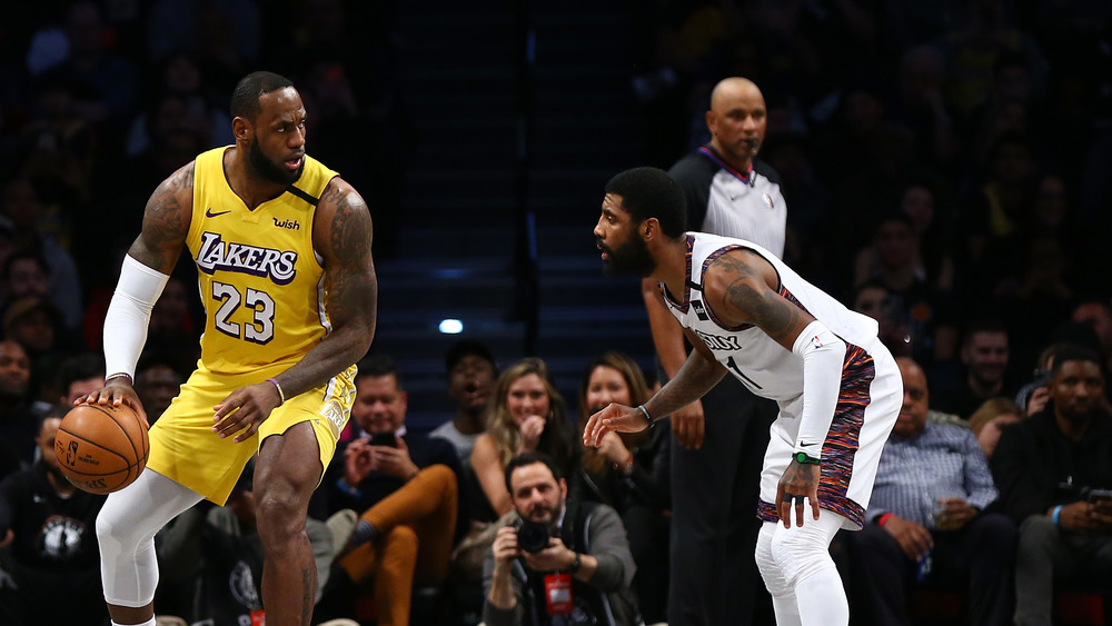 James and Irving playing basketball