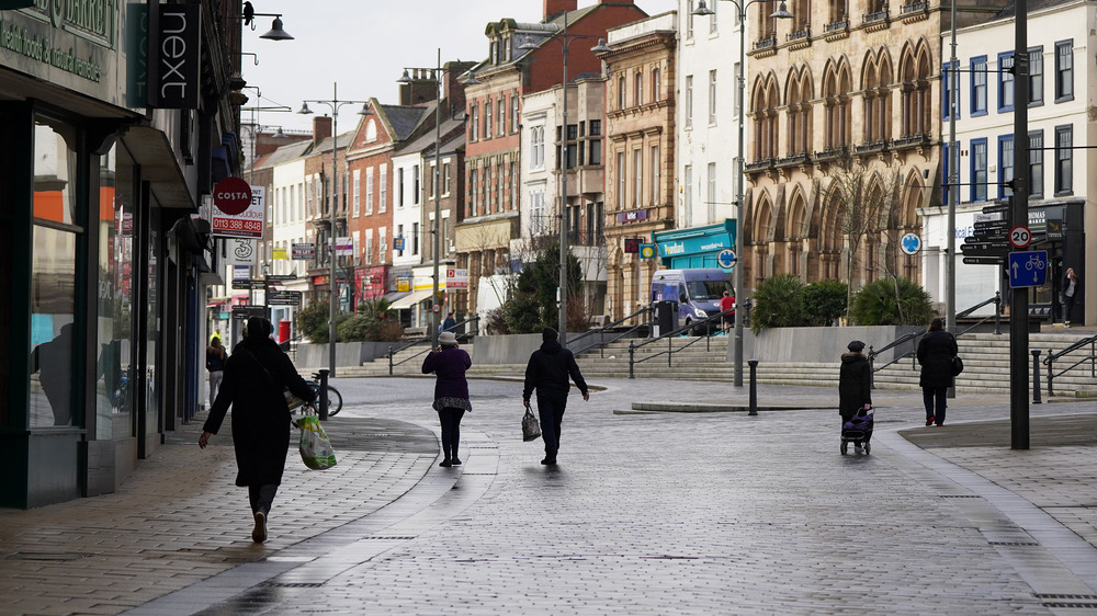 Pedestrians walking through town