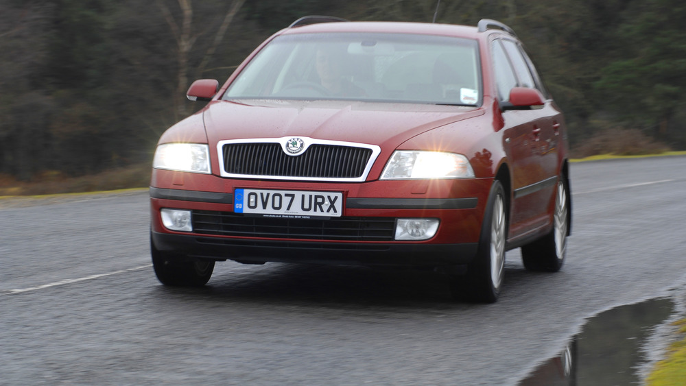 A picture of a car with its lights turned on