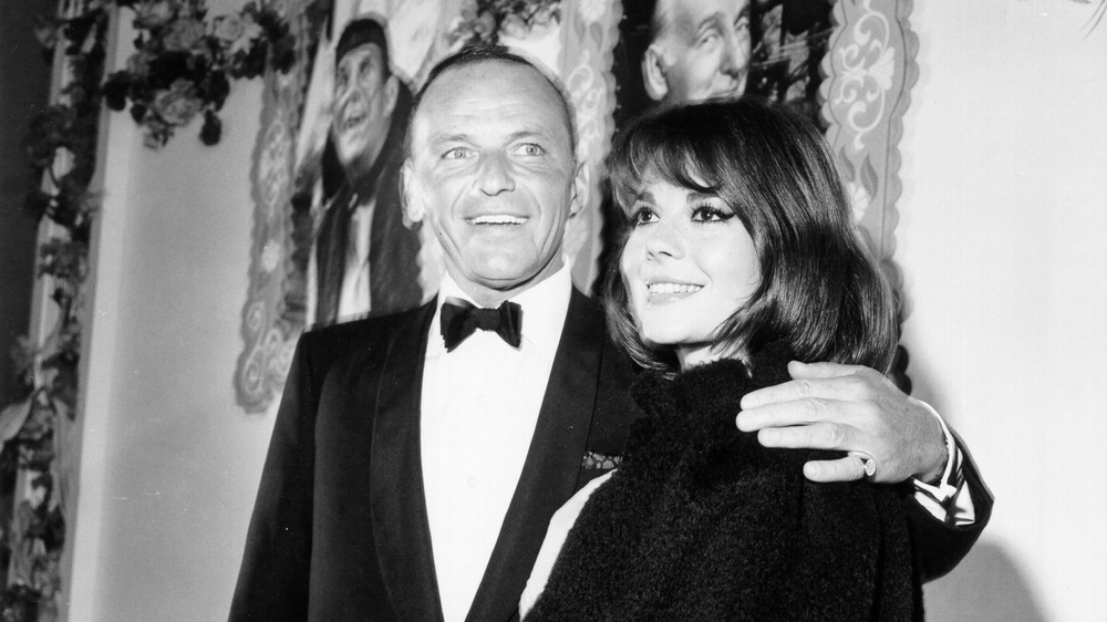 Frank Sinatra and Natalie Wood pose for photos, 1966
