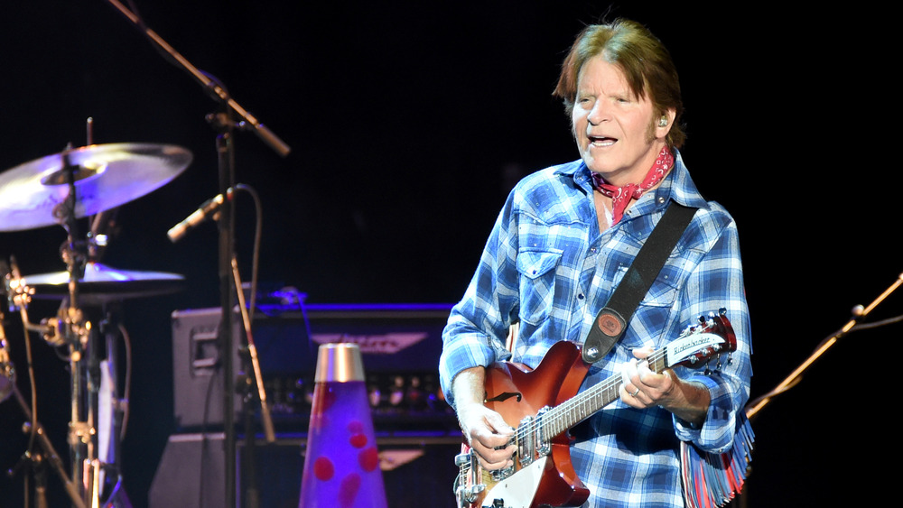 John Fogerty performing with guitar in 2019