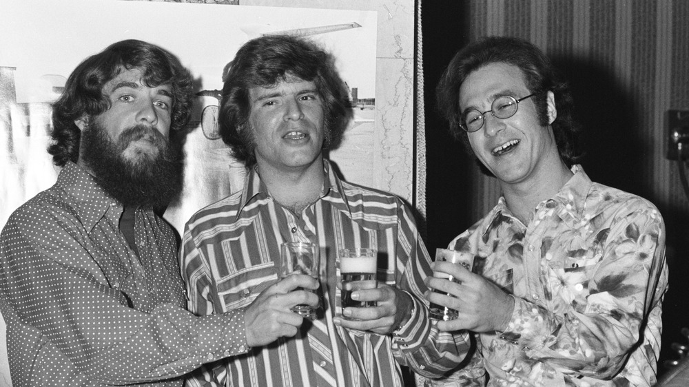 Creedence Clearwater Revival drinks a toast