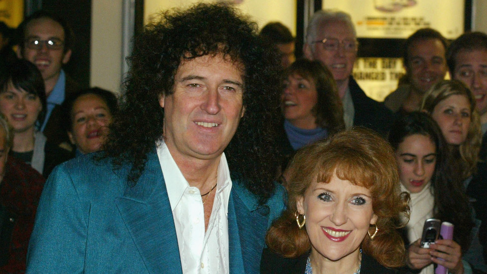 Anita Dobson smiling with Brian May