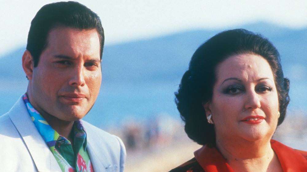 Montserrat Caballé with Freddie Mercury in front of mountains