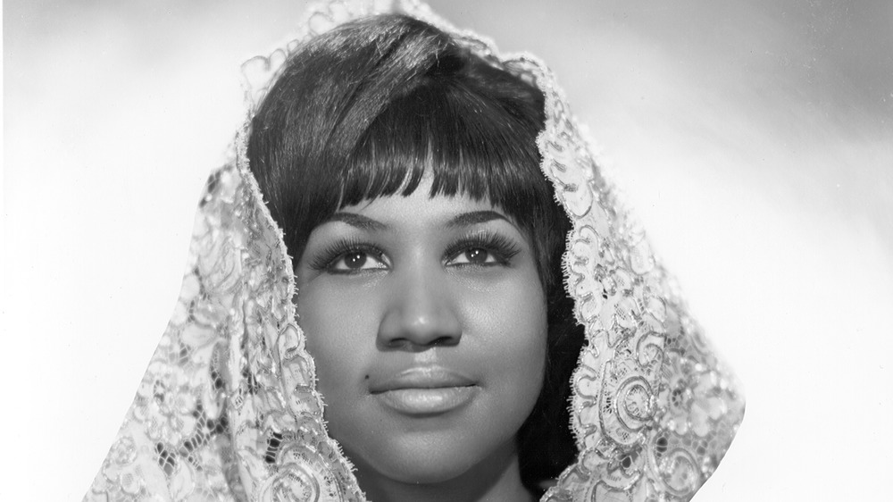 Aretha Franklin wearing lace veil