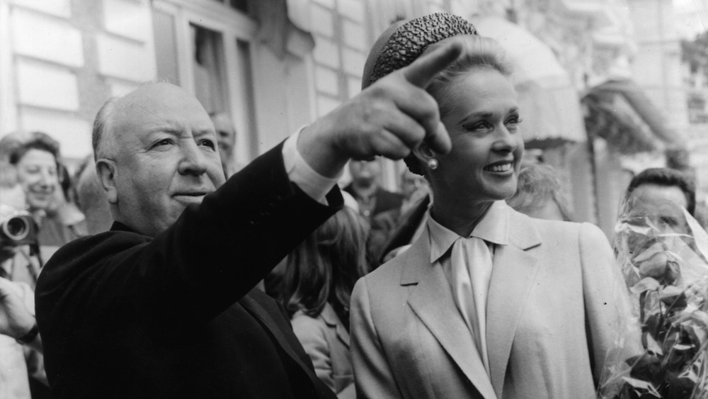 Tippi Hedren with Alfred Hitchcock pointing