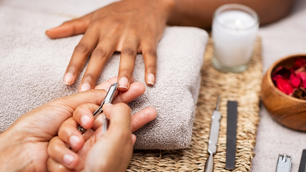 Close up of a manicure being given