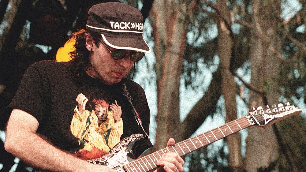 Joe Satriani plays the guitar