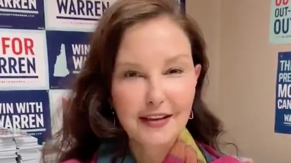 Ashley Judd smiling looking puffy