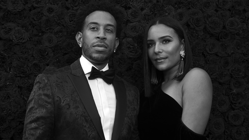 Ludacris and his wife Eudoxie Mbouguiengue in formal evening wear