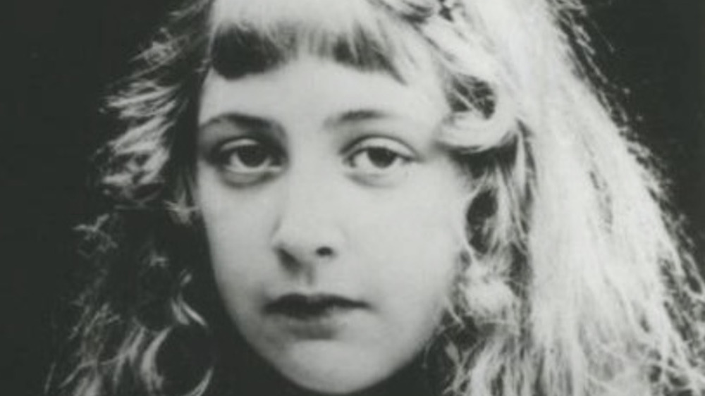 Agatha Christie as a child looking serious