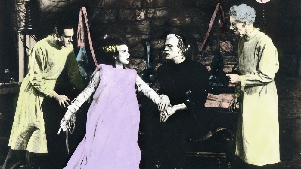 A publicity still of the cast of The Bride of Frankenstein in lab